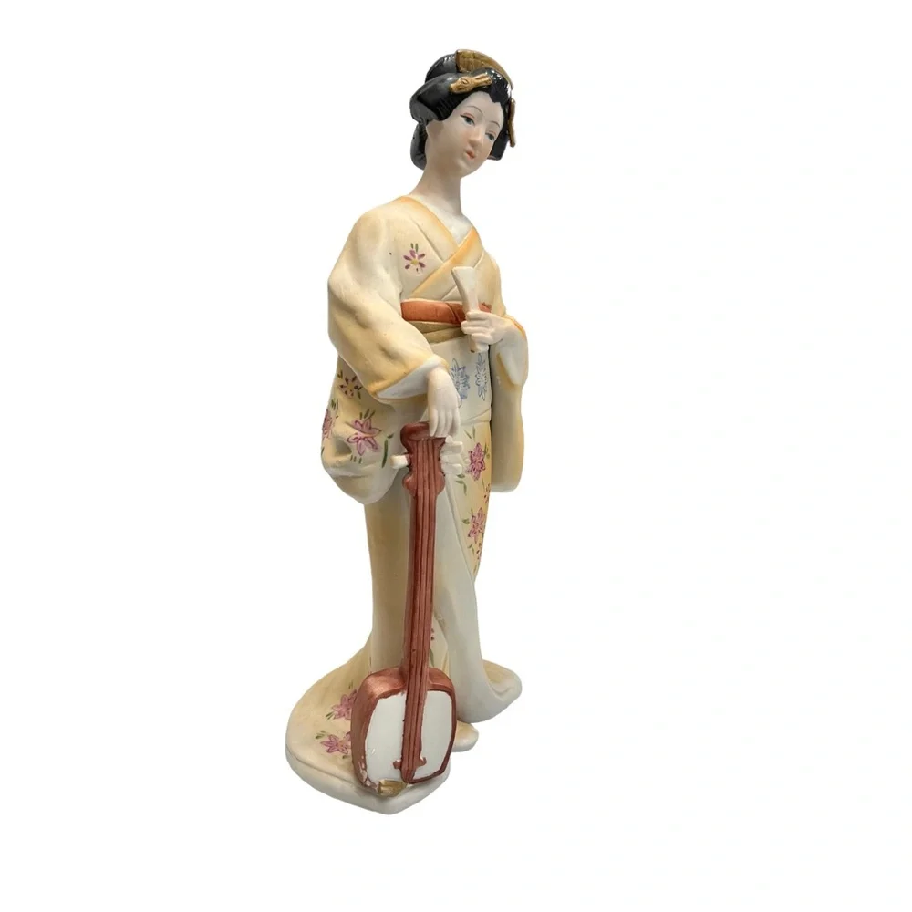 Vintage geisha holding